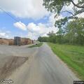 Man’s leg run over by vehicle behind pallet factory