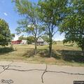 Open 911 call with chainsaw noise at rural property