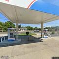 Person in car reportedly shows gun at gas station