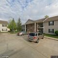 Fire alarm and smoke reported in building corridor