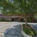 Suspicious person in parking lot at business