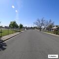 Neighbor repeatedly follows woman and her son