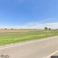 Grass from roadside mowing creating traffic hazard