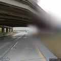 Car dragging object on eastbound interstate