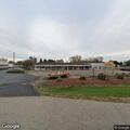 Suspicious man exercising in parking lot