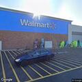 Woman switching price tags at Walmart