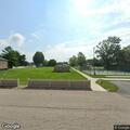 Suspicious man talking to unseen person at Fairland Park