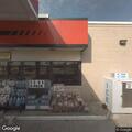 Person sleeping in running car in parking lot