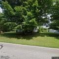 Minivan parked in yard reported as suspicious