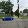 Homeless man with dog checked near roadway