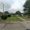 Woman tries to fight resident in front yard