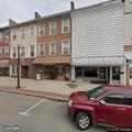 Man having a seizure outside outdoor store