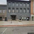 Woman found passed out on sidewalk near West Main Street