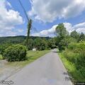 Tree removed from partially blocked road