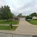 Suspicious person shining light into home window