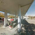 Driver leaves scene after hitting pole in parking lot