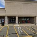 Man aggressively yelling at people in store lot