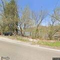 Car down hill with person inside on State Route 669