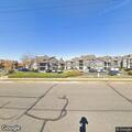 Person down inside vehicle at Aurora apartment complex