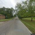 Driver threw objects at motorcyclist on roadway