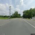 Woman vomiting and unwell near East Main Street