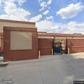 Person experiencing breathing difficulty outside Walmart