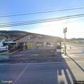 28-year-old male with knife stuck in throat at Flintstone store
