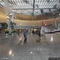 Unattended backpack at airport ticket counter