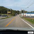 Young man with mental health issues walking on roadway