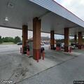 Intoxicated person lying outside gas station