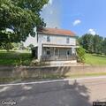 Bicyclist reportedly strikes house on Main Street