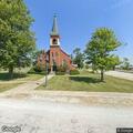 Woman asking for gas money at Zion Church
