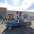 Officer checks suspicious vehicle in restaurant lot