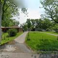 Complaint about loose dog behind Monroe Street home
