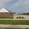 Bank reports person near bushes judged not suspicious