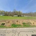 Woman assaulted in property-line dispute