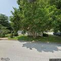 Loose dogs barking behind residence