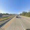 Disabled vehicle on I-495 shoulder near Claymont exit