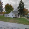 Person hammering on front of house reported