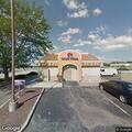 Person experiencing back pain at Taco Bell in Dayton