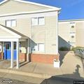 Couple refuses to leave hotel entrance in camper