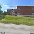 Elderly man needs lift after non-injury fall at school