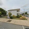 Complaint of man possibly urinating behind building