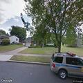 Tree branch touching high power line in Stratford
