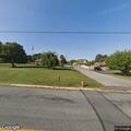 Person experiencing chest pain at Brindle Estates lobby