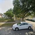 Open door with woman inside at Grand Boulevard home