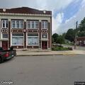 Truck hits parked van on West Main Street