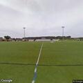 Person with severe knee cut at Clark Field