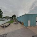 Suspicious male walking in alley behind service center
