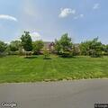 Elderly woman coughing and fatigued at Brandywine Living